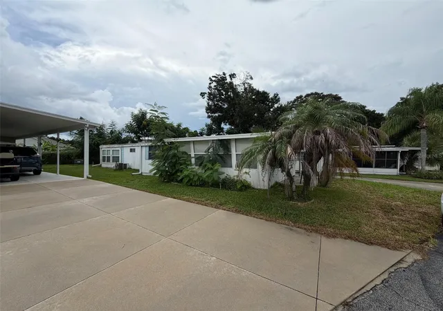 Photo 3 of Single family home for sale at 112 Holiday Ln, Auburndale, FL 33823 | MLS# O6440504 | Listing updated on 2026-10-07
