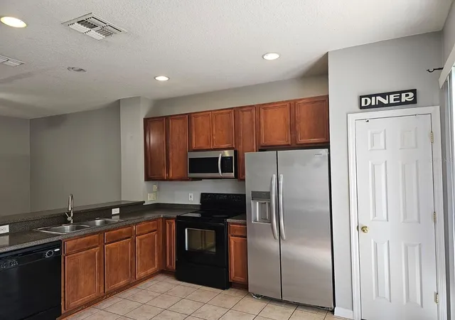 Photo 3 of Townhouse for sale at 5116 Dominica Dr, Kissimmee, FL 34746 | MLS# S5157261 | Listing updated on 2026-09-11