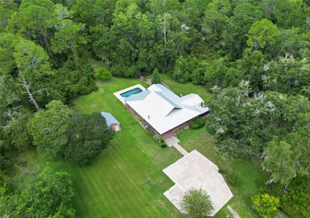 Photo 3 of Single family home for sale at 10710 NE 81st Street, Gainesville, FL 32609 | MLS# OM731989 | Listing updated on 2026-09-22