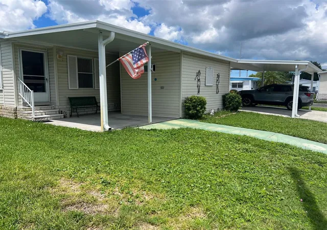 Photo 2 of Manufactured home for sale at 1 Thatch Palm St W, Largo, FL 33770 | MLS# TB8547179 | Listing updated on 2026-09-11
