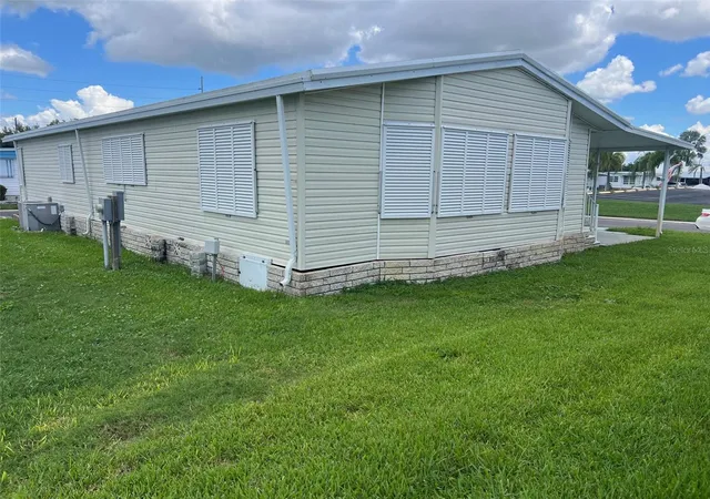 Photo 4 of Manufactured home for sale at 1 Thatch Palm St W, Largo, FL 33770 | MLS# TB8547179 | Listing updated on 2026-09-11