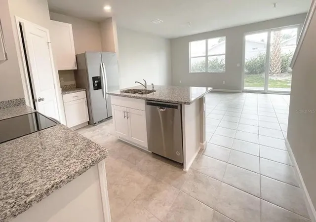 Photo 2 of Townhouse for sale at 1648 Lindley St, Mangonia Park, FL 33407 | MLS# O6440635 | Listing updated on 2026-09-12