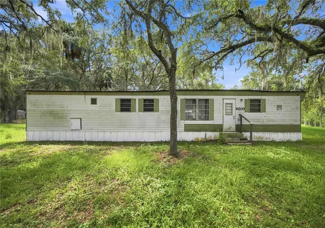Photo 3 of Manufactured home for sale at 14200 Ne 165th Street, Fort Mc Coy, FL 32134 | MLS# OM732016 | Listing updated on 2026-09-11
