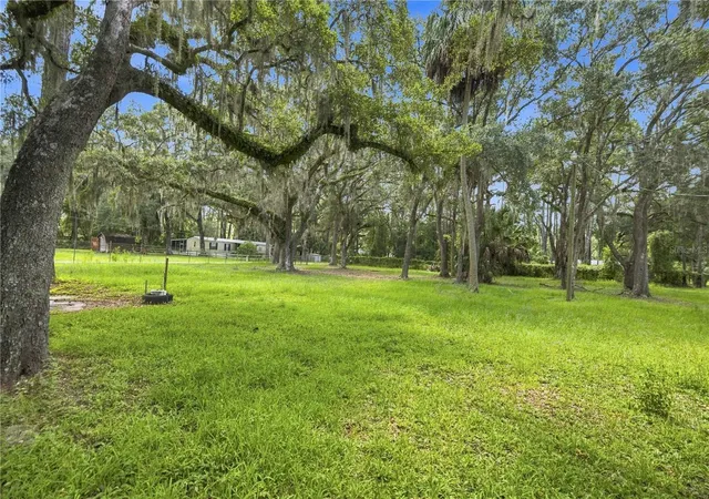 Photo 3 of Manufactured home for sale at 14200 NE 165th Street, Fort Mc Coy, FL 32134 | MLS# OM732016 | Listing updated on 2026-09-11