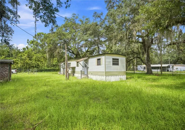 Photo 4 of Manufactured home for sale at 14200 NE 165th Street, Fort Mc Coy, FL 32134 | MLS# OM732016 | Listing updated on 2026-09-11