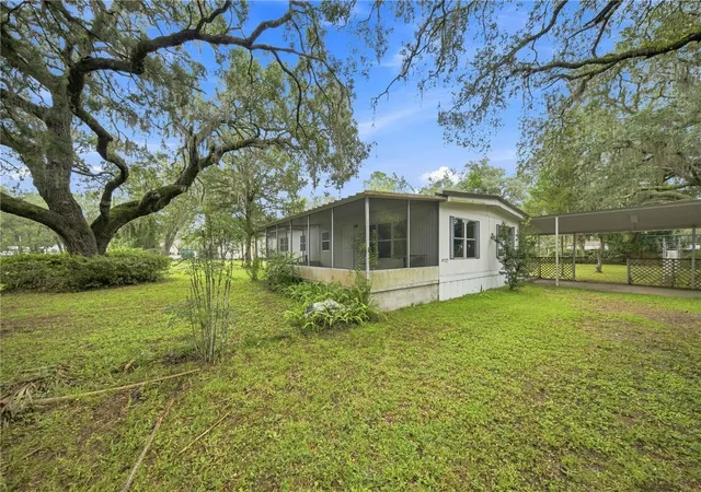 Photo 1 of Manufactured home for sale at 15470 Ne Highway 314, Silver Springs, FL 34488 | MLS# OM732020 | Listing updated on 2026-09-11