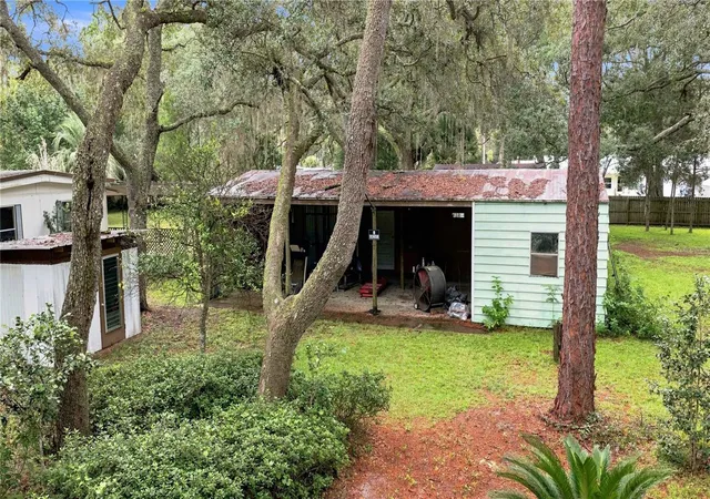 Photo 2 of Manufactured home for sale at 15470 Ne Highway 314, Silver Springs, FL 34488 | MLS# OM732020 | Listing updated on 2026-09-11