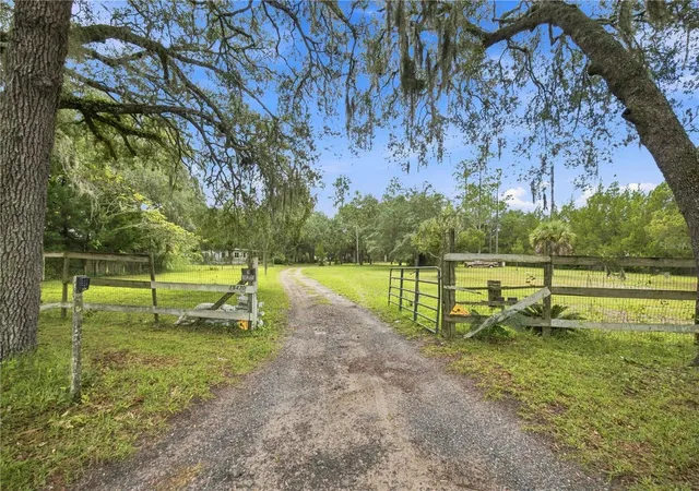 Photo 3 of Manufactured home for sale at 15470 NE Highway 314, Silver Springs, FL 34488 | MLS# OM732020 | Listing updated on 2026-09-11