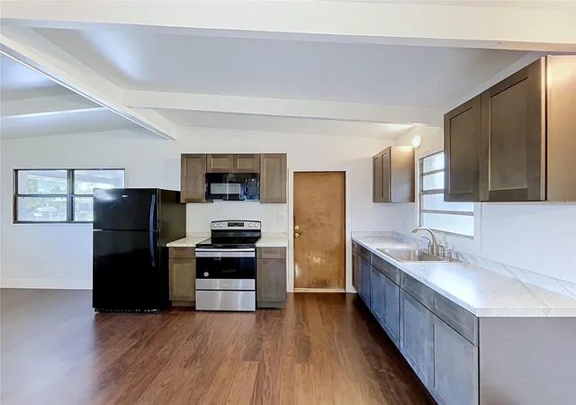 Photo 3 of Single family home for sale at 1310 Warrington Way, Tampa, FL 33619 | MLS# TB8547342 | Listing updated on 2026-10-21