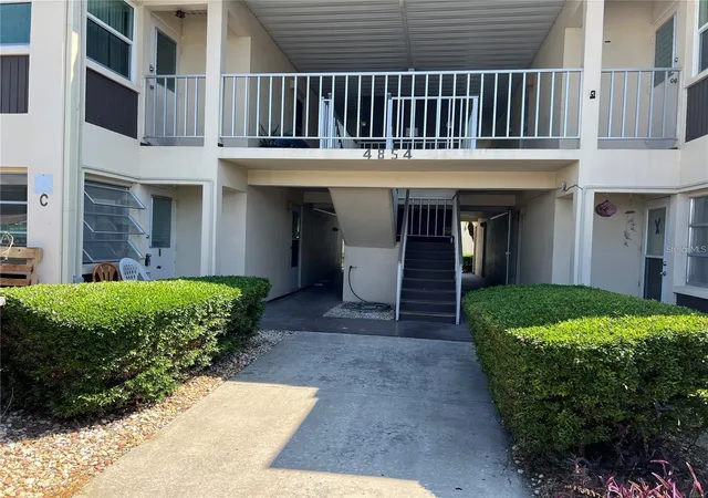 Photo 1 of Condo for sale at 4854 Marine Pkwy #103, New Port Richey, FL 34652 | MLS# TB8547468 | Listing updated on 2026-09-22