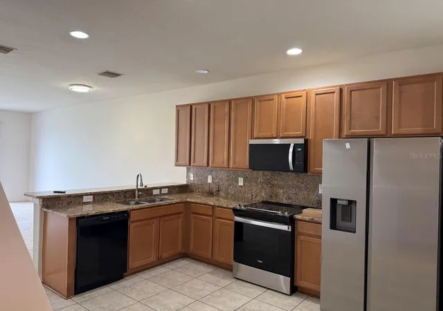 Photo 3 of Townhouse for sale at 4976 White Sanderling Ct, Tampa, FL 33619 | MLS# TB8547559 | Listing updated on 2026-10-02
