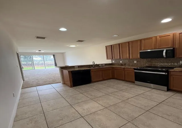 Photo 3 of Townhouse for sale at 4976 White Sanderling Ct, Tampa, FL 33619 | MLS# TB8547559 | Listing updated on 2026-10-22