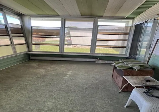 Photo 3 of Manufactured home for sale at 2326 Lemur Dr, Holiday, FL 34690 | MLS# TB8547610 | Listing updated on 2026-09-11
