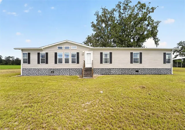 Photo 2 of Single family home for sale at 15271 Ne County Rd 339, Trenton, FL 32693 | MLS# OM732089 | Listing updated on 2026-10-02