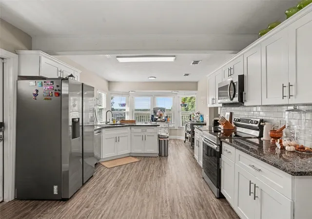 Photo 3 of Single family home for sale at 705 Lake Ada Blvd, Dundee, FL 33838 | MLS# TB8547905 | Listing updated on 2026-10-03