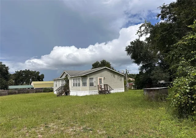 Photo 1 of Manufactured home for sale at 10305 SE 148th Street, Summerfield, FL 34491 | MLS# OM732137 | Listing updated on 2026-09-15