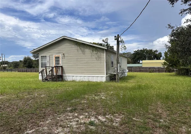 Photo 2 of Manufactured home for sale at 10305 SE 148th Street, Summerfield, FL 34491 | MLS# OM732137 | Listing updated on 2026-09-15