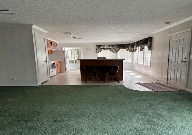 Photo 4 of Manufactured home for sale at 10305 SE 148th Street, Summerfield, FL 34491 | MLS# OM732137 | Listing updated on 2026-09-15