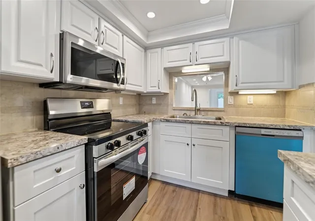 Listing Photo 5 - Condo for sale in building located at 4217 Stratford Dr, NEW PORT RICHEY, FL 34652 - Unit #0