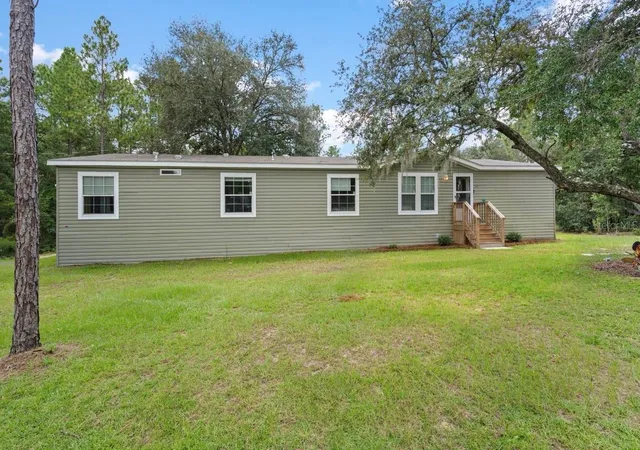 Photo 1 of Manufactured home for sale at 13850 Ne 52nd Place, Williston, FL 32696 | MLS# GC543506 | Listing updated on 2026-09-24