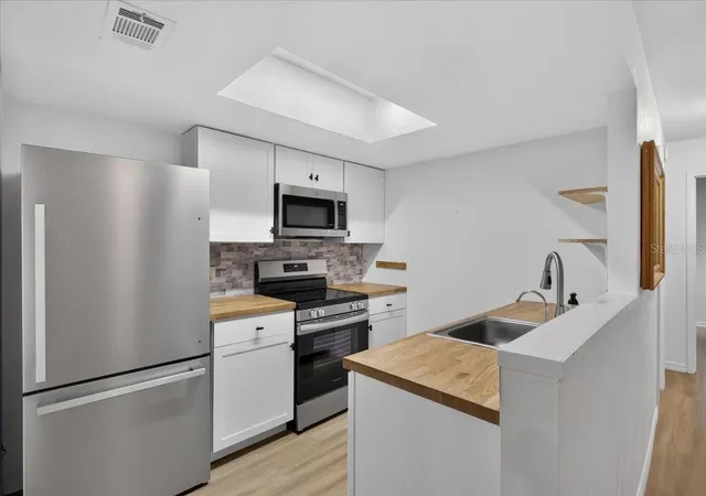 Photo 4 of Single family home for sale at 5204 NW 34th Place, Gainesville, FL 32606 | MLS# GC543509 | Listing updated on 2026-09-22