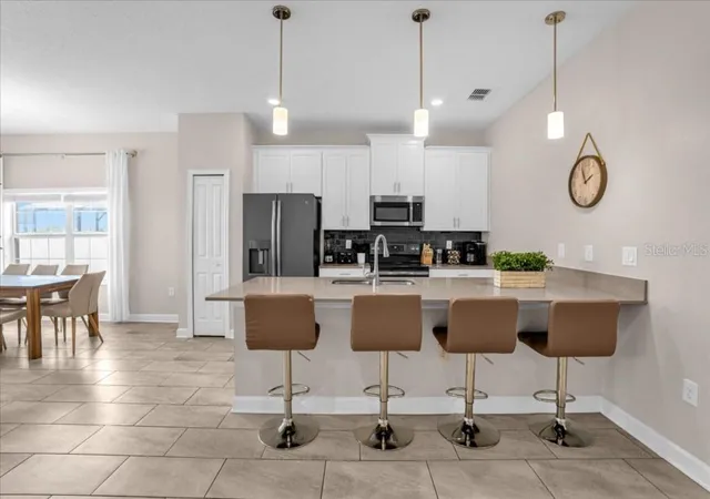 Photo 3 of Townhouse for sale at 8997 Stinger Dr, Davenport, FL 33896 | MLS# O6441627 | Listing updated on 2026-10-06