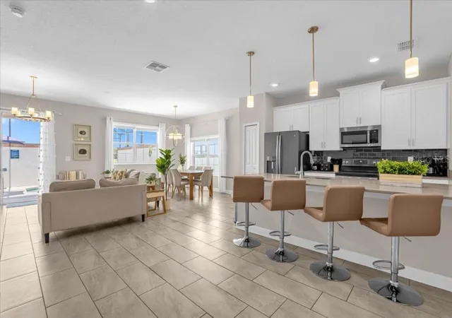 Photo 4 of Townhouse for sale at 8997 Stinger Dr, Davenport, FL 33896 | MLS# O6441627 | Listing updated on 2026-10-06