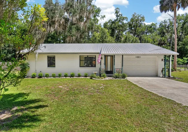 Photo 1 of Single family home for sale at 104 Woodcrest Ave, Satsuma, FL 32189 | MLS# FC321450 | Listing updated on 2026-09-28