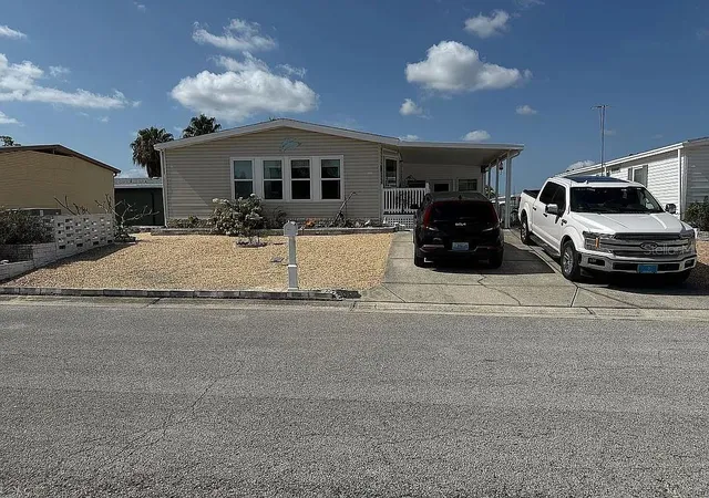 Photo 1 of Manufactured home for sale at 7306 Cascade Dr, Hudson, FL 34667 | MLS# W7889524 | Listing updated on 2026-09-15