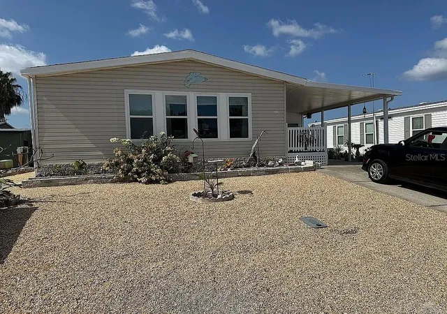 Photo 2 of Manufactured home for sale at 7306 Cascade Dr, Hudson, FL 34667 | MLS# W7889524 | Listing updated on 2026-09-15