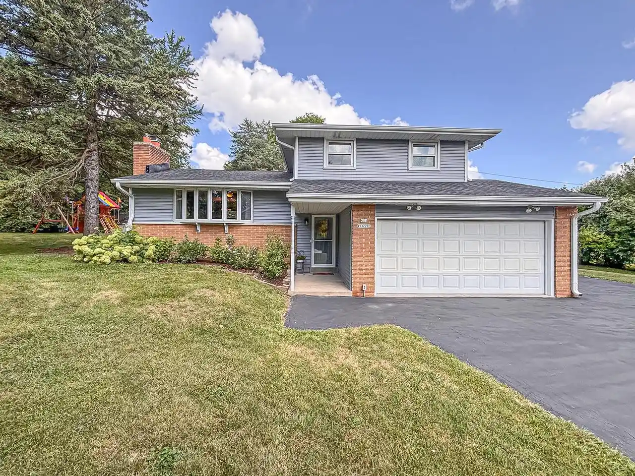 1st image of N51w16590 Fair Oak Court Court, Menomonee Falls, WI 53051 | MLS# 1975016