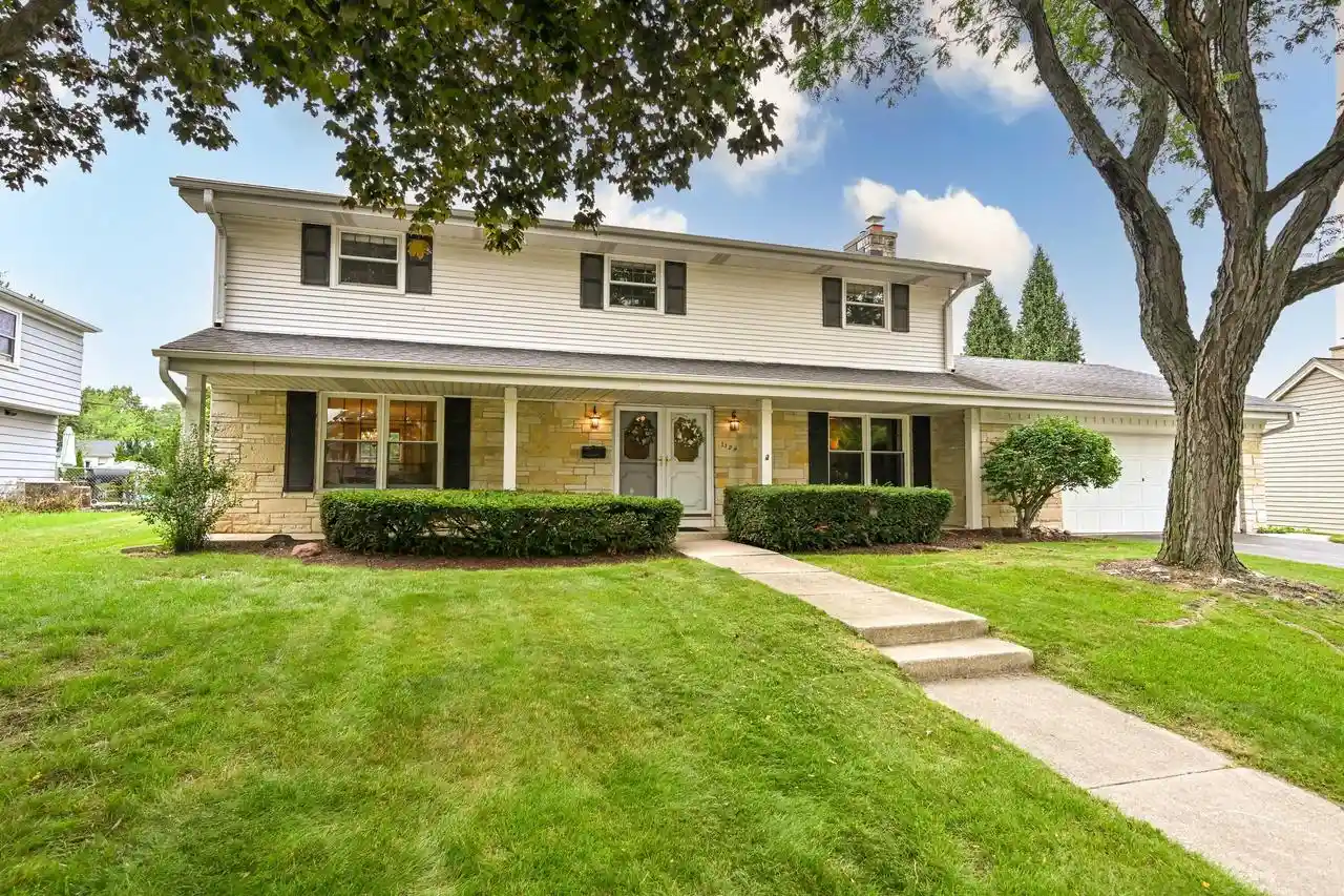 Photo 1 of Single family home for sale at 1128 Downing Dr Dr, Waukesha, WI 53186 | MLS# 1975684 | Listing updated on 2026-09-16