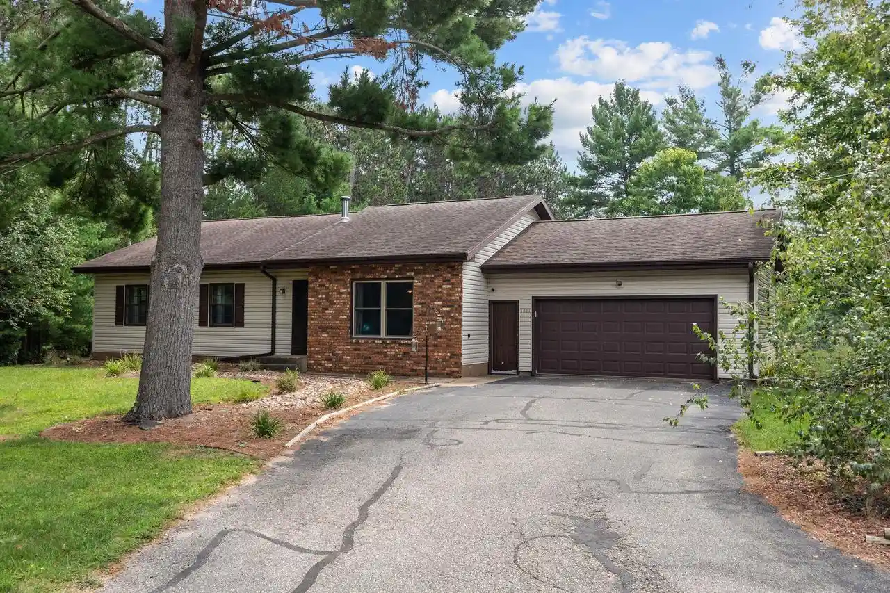 Photo 1 of Single family home for sale at 1811 Whispering Pine Dr, Plover, WI 54467 | MLS# 22604349 | Listing updated on 2026-09-15