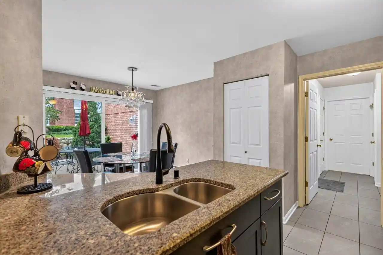 Photo 2 of Condo for sale at 8779 Woodbridge Dr, Greendale, WI 53129 | MLS# 1981277 | Listing updated on 2026-10-07