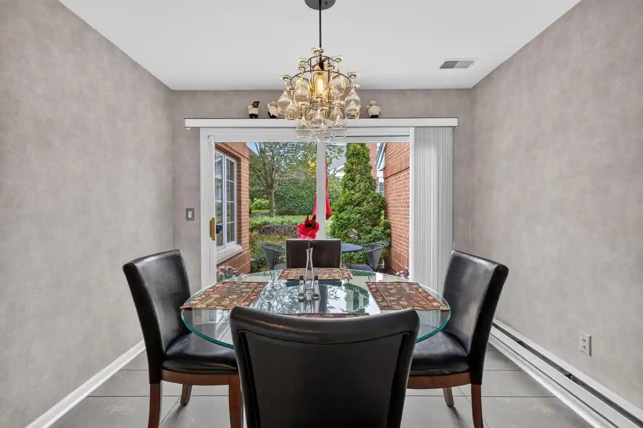 Photo 3 of Condo for sale at 8779 Woodbridge Dr, Greendale, WI 53129 | MLS# 1981277 | Listing updated on 2026-10-07