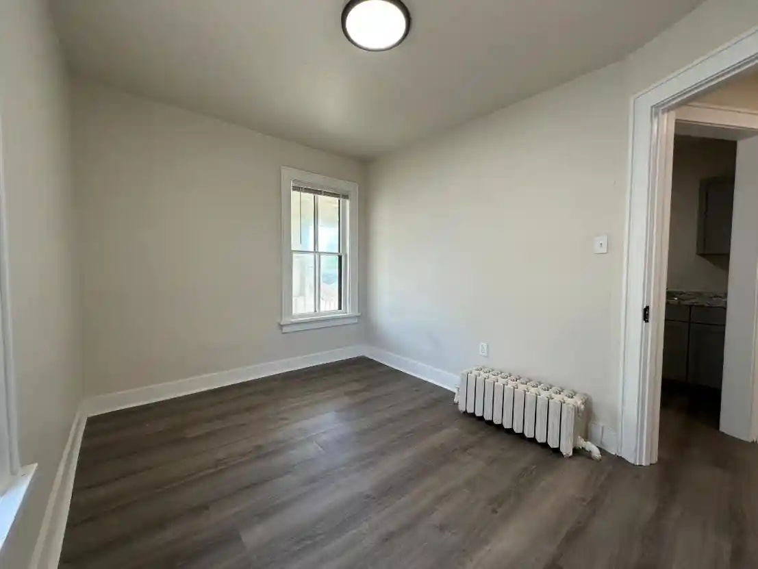Photo 3 of Multi family home for sale at 113 S Monroe Ave, Green Bay, WI 54301 | MLS# 50333947 | Listing updated on 2026-10-07