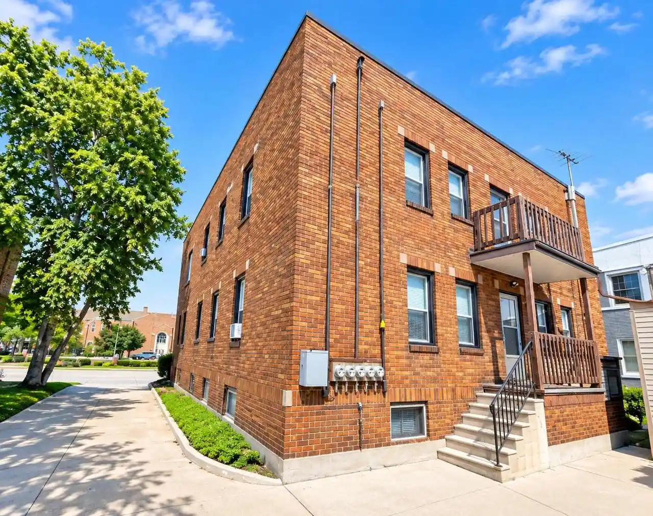 Photo 2 of Multi family home for sale at 215 S Monroe Ave, Green Bay, WI 54301 | MLS# 50334436 | Listing updated on 2026-10-16