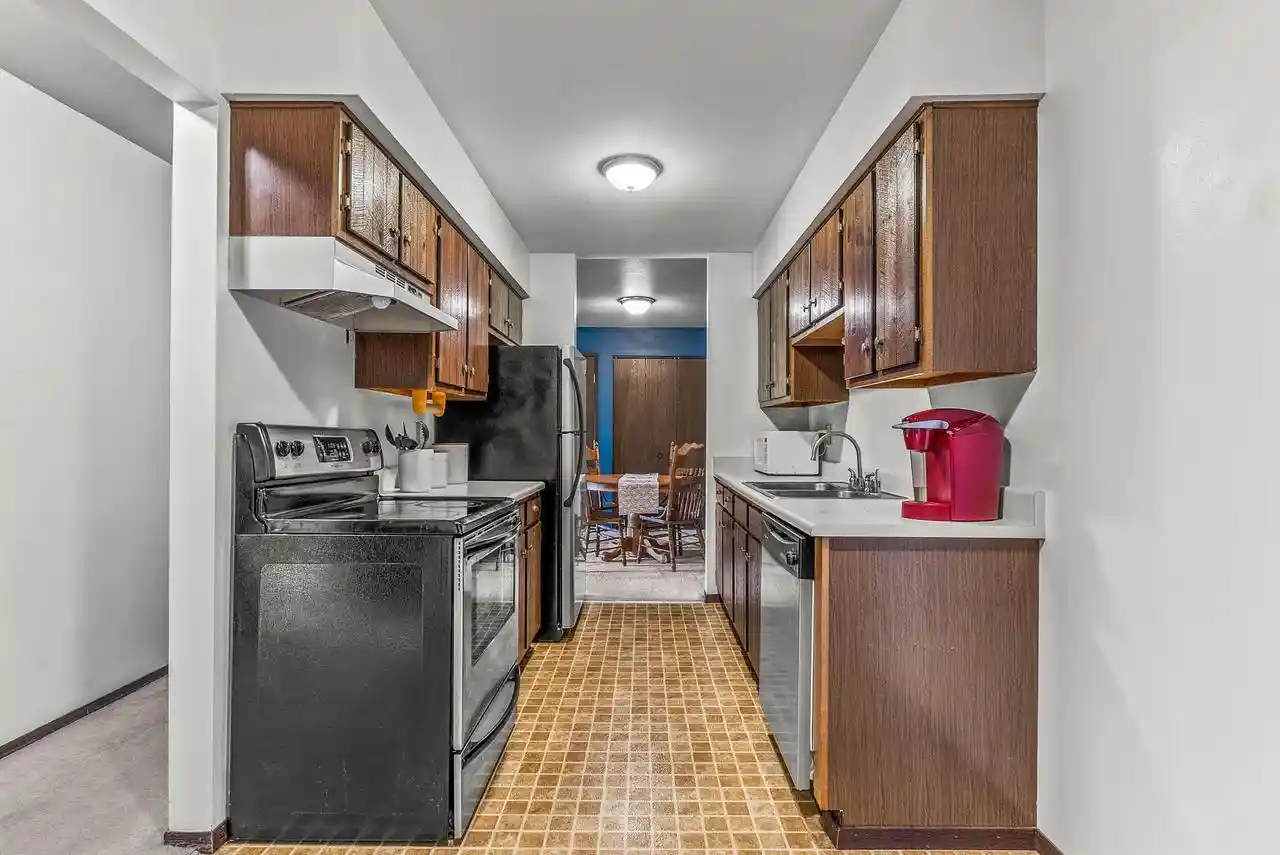Photo 3 of Condominium at 6440 W Howard Avenue Avenue #103, Milwaukee, WI 53220 | MLS# 1801769 | | Sold on 2022-08-23