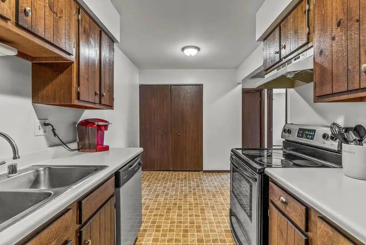 Photo 4 of Condominium at 6440 W Howard Avenue Avenue #103, Milwaukee, WI 53220 | MLS# 1801769 | | Sold on 2022-08-23